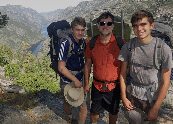 Jeremy Roschelle backpacking with his sons.