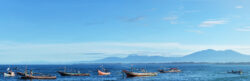 Meloy Fund - photo of boats on the water in Indonesia.