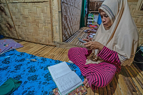 Nurlini is a fish buyer in Siompu, Indonesia (located is SE Sulawesi). She logs all of her transactions by hand and then inputs it all in the OurFish app in the evenings to avoid getting fish slime on her phone.