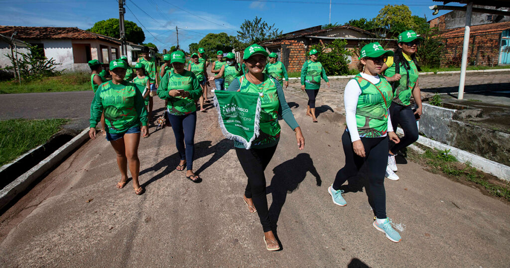 Local community members of Resex São João da Ponta participate in #GreenJuly activities and march through the city.