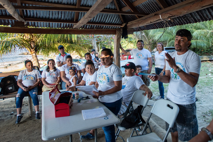 women leading a savings club in Honduras.