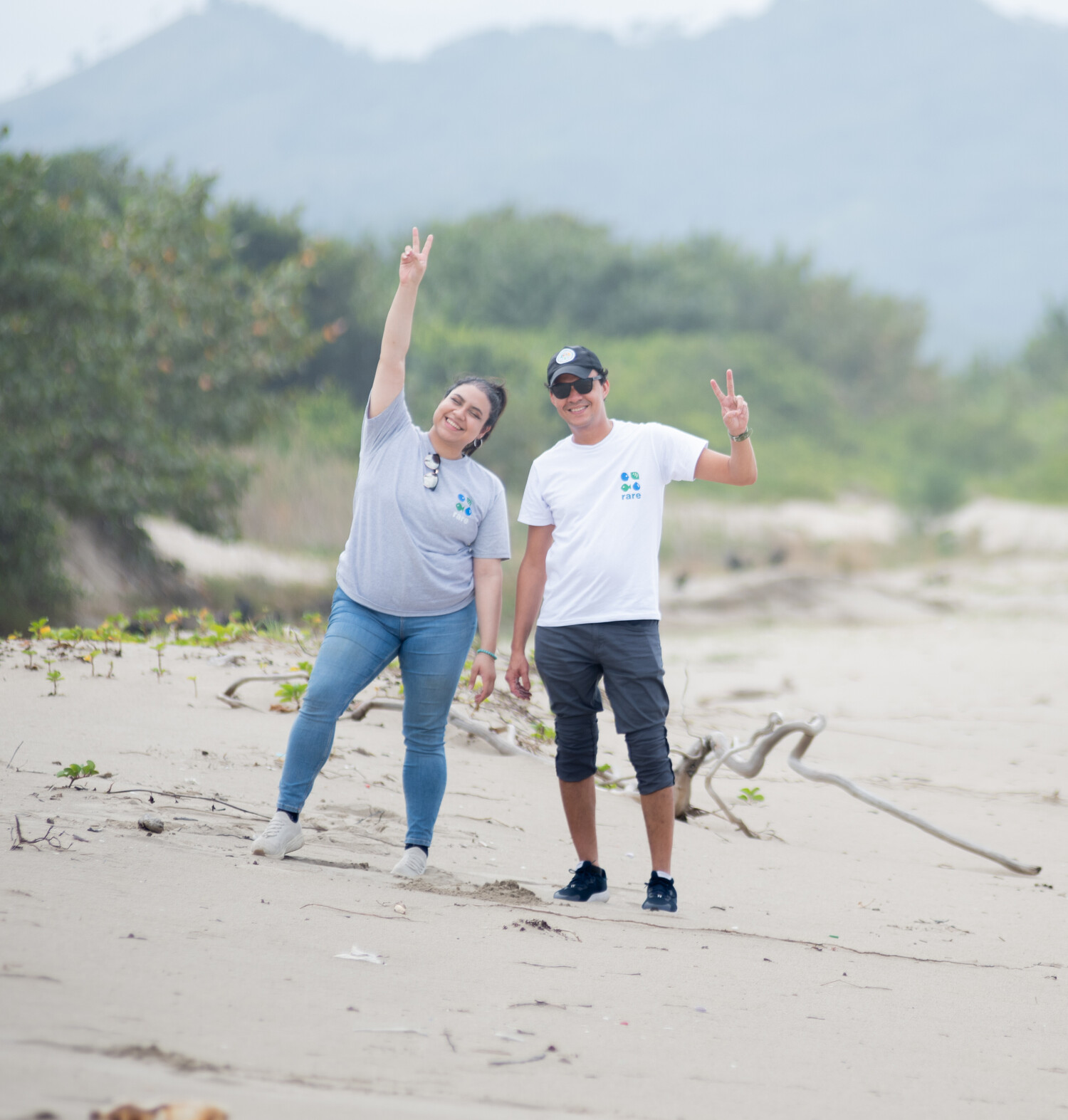 Vicky and Emilio from Rare Fish Forever team on the beach in Honduras.