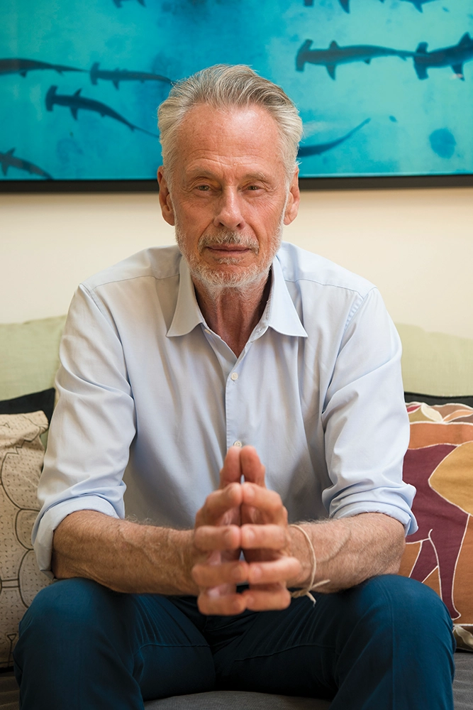 Sven Lindblad sitting indoors looking directly at the camera.