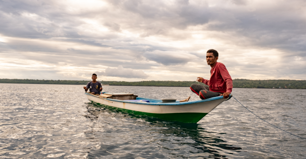 Local fishers Dedi and La Naimu fishing along the coast of Pasi Kolaga in Southeast Sulawesi, Indonesia.