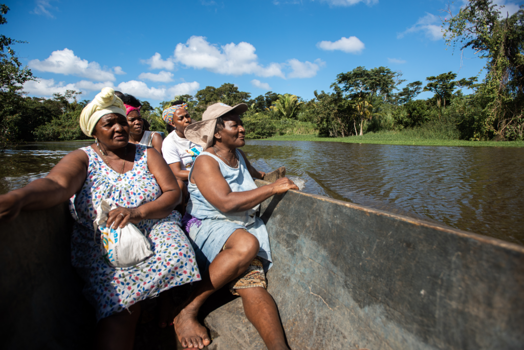 Honduran women in a canoe.