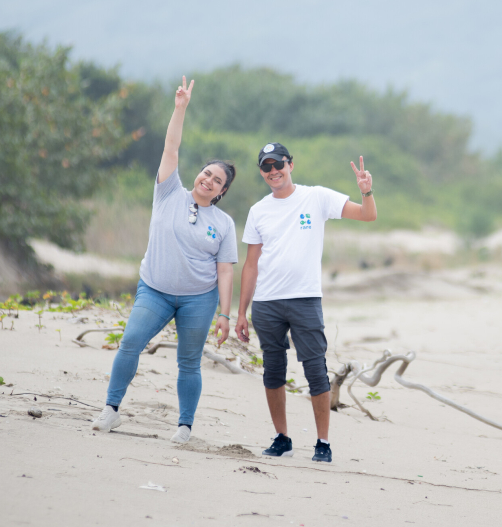 Vicky and Emilio from Rare Fish Forever team on the beach in Honduras.